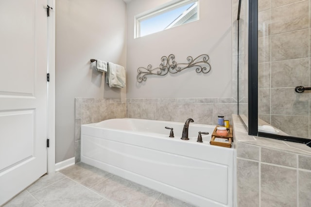 679 Overton Way, Spring Hill, TN 37174 - bathroom with a bath and tile patterned flooring