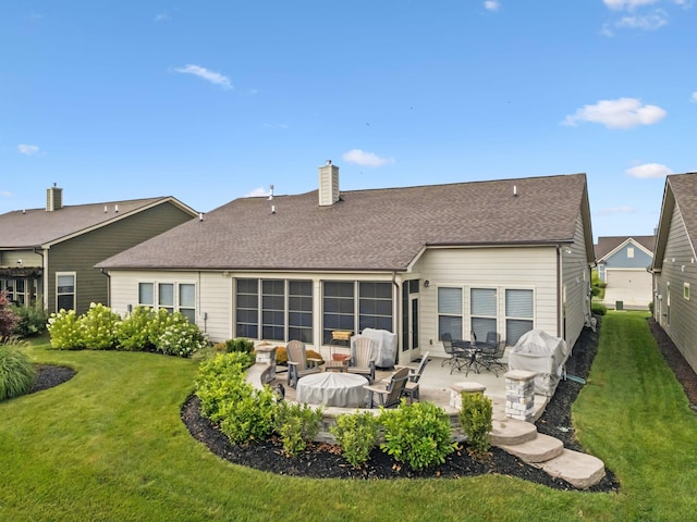 679 Overton Way, Spring Hill, TN 37174 - rear view of property featuring a yard, a chimney, a patio area, and roof with shingles