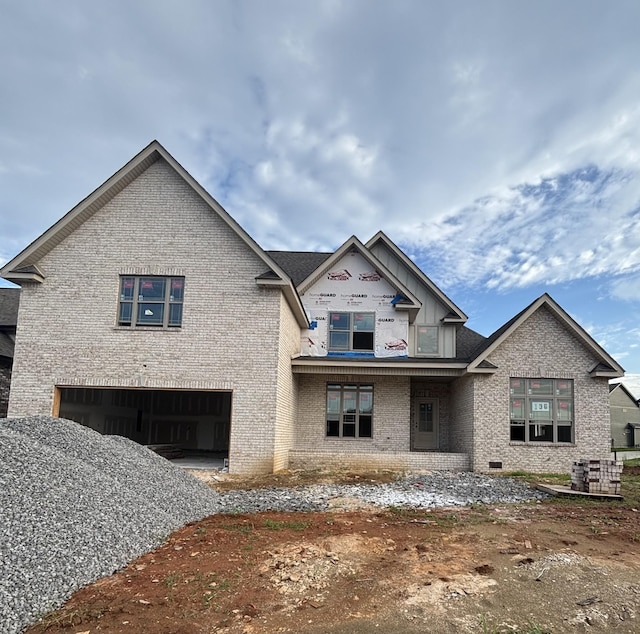 442 Spiderwort Dr, Clarksville, TN 37043 - view of front of property featuring brick siding, an attached garage, and driveway