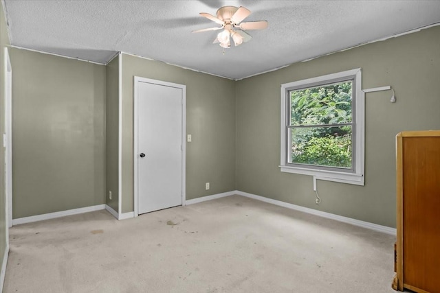 106 Ulcer Hollow Rd, Waverly, TN 37185 - unfurnished bedroom with a textured ceiling, carpet flooring, and a ceiling fan