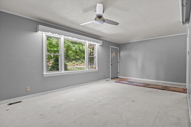 106 Ulcer Hollow Rd, Waverly, TN 37185 - carpeted empty room with a ceiling fan, a textured ceiling, and ornamental molding