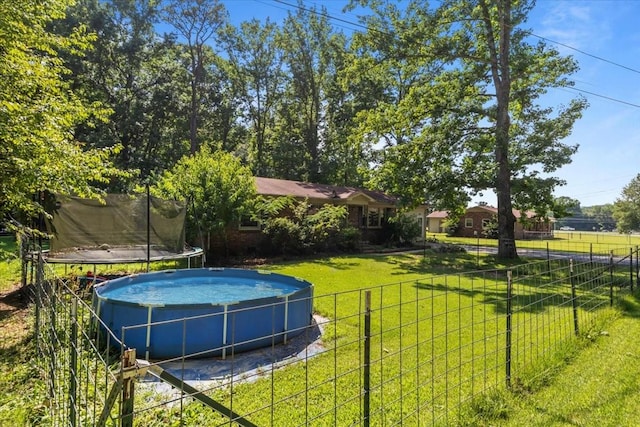 106 Ulcer Hollow Rd, Waverly, TN 37185 - view of yard with a trampoline