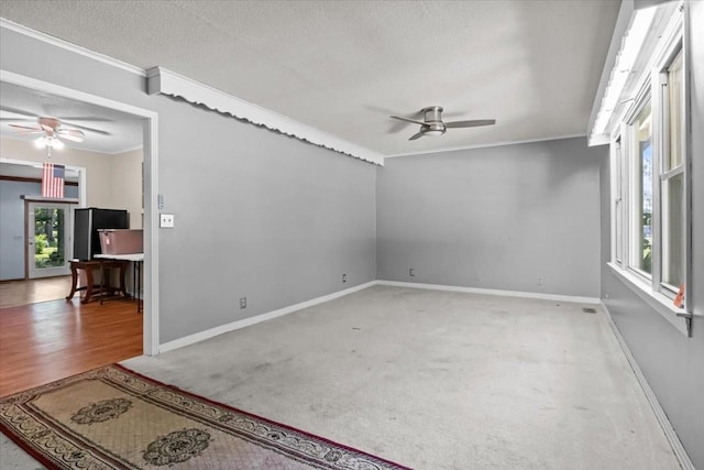 106 Ulcer Hollow Rd, Waverly, TN 37185 - carpeted spare room with ceiling fan, ornamental molding, and a textured ceiling