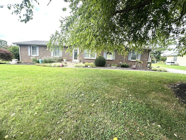 412 Winwood Dr, Lebanon, TN 37087 - view of front of home featuring brick siding and a front yard