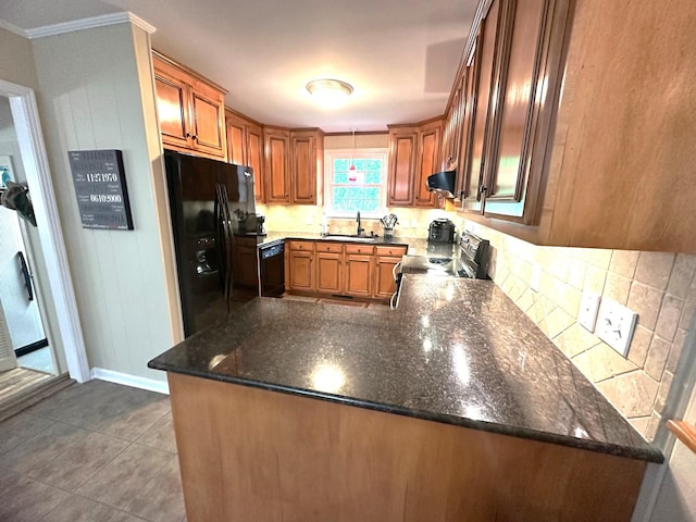 412 Winwood Dr, Lebanon, TN 37087 - kitchen featuring black appliances, backsplash, extractor fan, brown cabinetry, and dark stone countertops