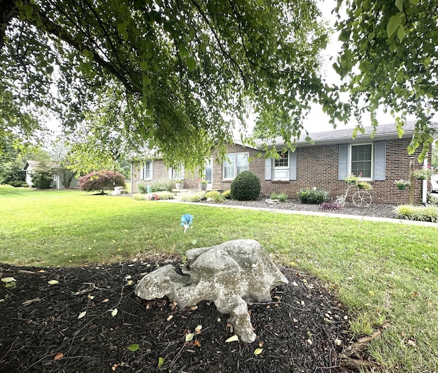 412 Winwood Dr, Lebanon, TN 37087 - ranch-style house featuring a front yard and brick siding