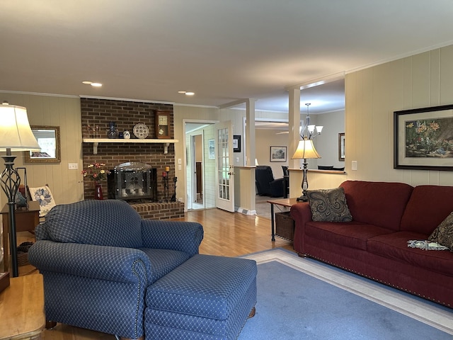 412 Winwood Dr, Lebanon, TN 37087 - living room with crown molding, wood finished floors, and a brick fireplace