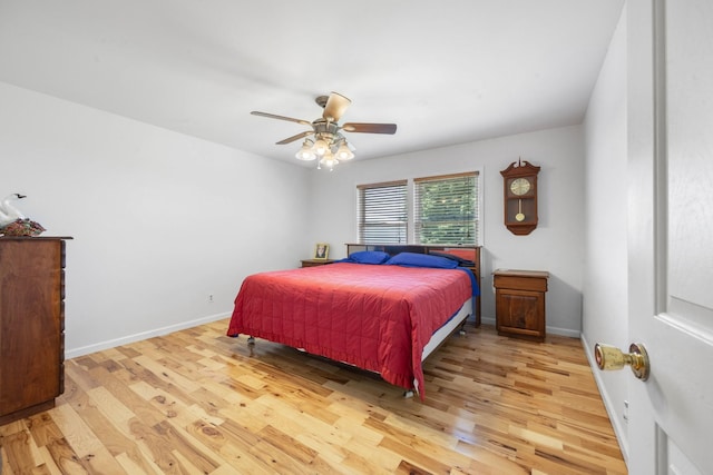 3899 Sadlersville Rd, Adams, TN 37010 - bedroom featuring wood finished floors and a ceiling fan