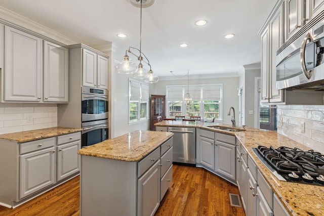 2105 Chels Way, Old Hickory, TN 37138 - kitchen with appliances with stainless steel finishes, gray cabinets, crown molding, recessed lighting, and a peninsula