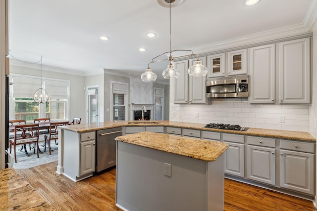 2105 Chels Way, Old Hickory, TN 37138 - kitchen featuring appliances with stainless steel finishes, gray cabinets, ornamental molding, a kitchen island, and recessed lighting