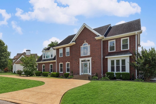 2105 Chels Way, Old Hickory, TN 37138 - view of front of house with brick siding, a front lawn, and roof with shingles