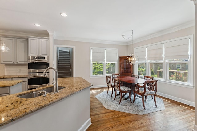 2105 Chels Way, Old Hickory, TN 37138 - dining space with ornamental molding, light wood-style floors, a chandelier, and recessed lighting