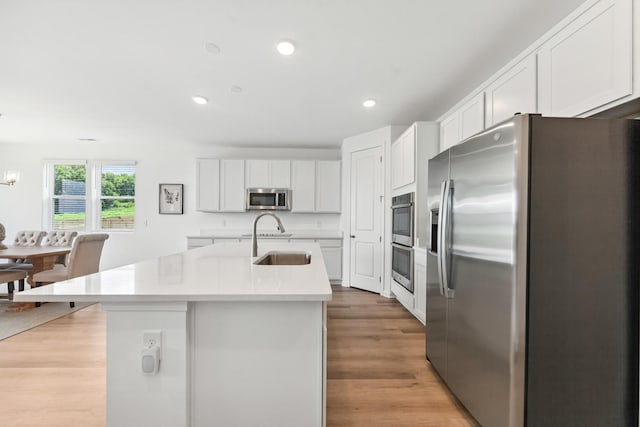 2337 Williamsport Lndg, Columbia, TN 38401 - kitchen featuring stainless steel appliances, light countertops, white cabinetry, and recessed lighting
