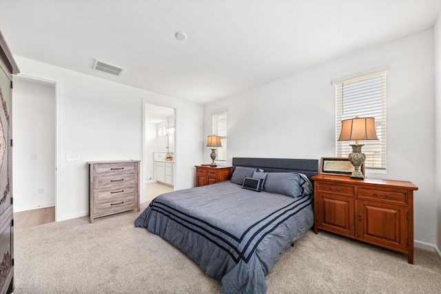 2337 Williamsport Lndg, Columbia, TN 38401 - bedroom featuring light colored carpet and connected bathroom