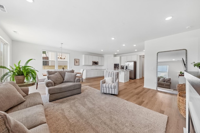 2337 Williamsport Lndg, Columbia, TN 38401 - living area with a chandelier, recessed lighting, and light wood-type flooring