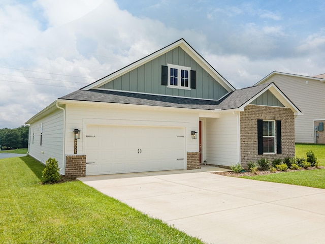 2337 Williamsport Lndg, Columbia, TN 38401 - craftsman-style house featuring board and batten siding, brick siding, driveway, and a front lawn