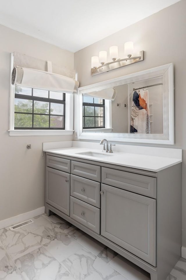 117 Maple Way N, Hendersonville, TN 37075 - bathroom featuring vanity, healthy amount of natural light, and marble look tiles
