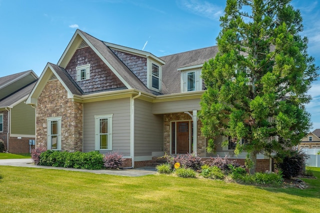 8146 Perfect Vw, Ooltewah, TN 37363 - craftsman house with a front lawn, stone siding, and a shingled roof