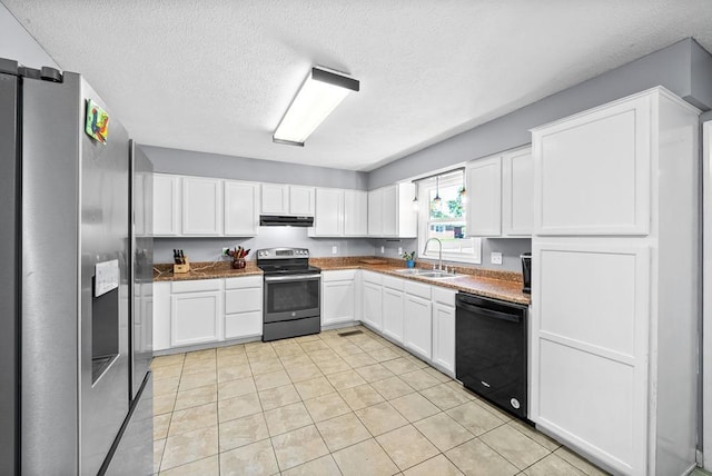 705 Pineridge Dr, Hopkinsville, KY 42240 - kitchen featuring appliances with stainless steel finishes, under cabinet range hood, a textured ceiling, light tile patterned floors, and white cabinets