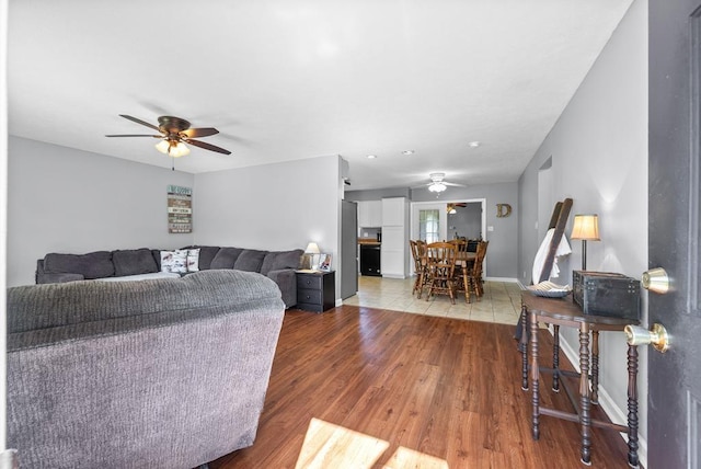 705 Pineridge Dr, Hopkinsville, KY 42240 - living area featuring ceiling fan and wood finished floors