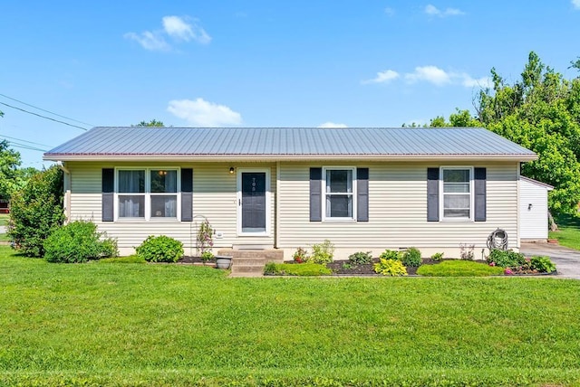 705 Pineridge Dr, Hopkinsville, KY 42240 - ranch-style house with a front yard and a metal roof