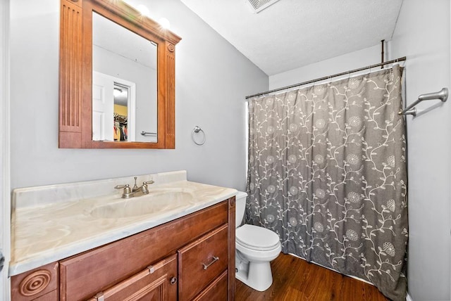 705 Pineridge Dr, Hopkinsville, KY 42240 - bathroom with vanity, wood finished floors, and a shower with shower curtain