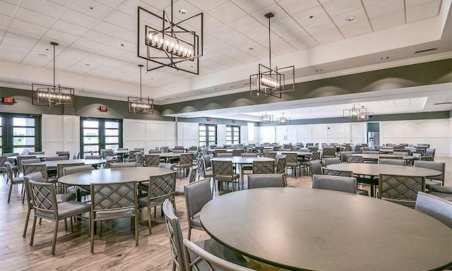1055 Sumner Grv, Spring Hill, TN 37174 - dining space with wood finished floors, a chandelier, healthy amount of natural light, and a drop ceiling