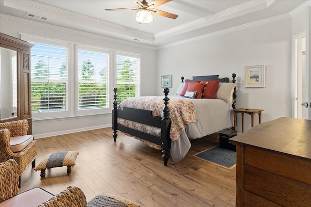 1055 Sumner Grv, Spring Hill, TN 37174 - bedroom featuring a raised ceiling, light wood finished floors, ornamental molding, and ceiling fan