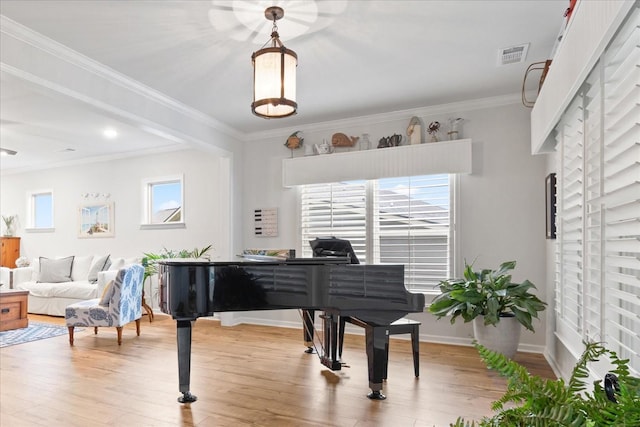 1055 Sumner Grv, Spring Hill, TN 37174 - sitting room featuring light wood-style floors and crown molding