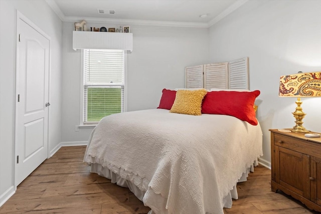 1055 Sumner Grv, Spring Hill, TN 37174 - bedroom with crown molding and wood finished floors