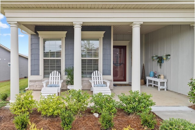 1055 Sumner Grv, Spring Hill, TN 37174 - view of exterior entry featuring a porch