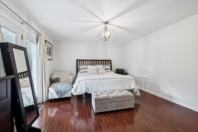 9505 Inavale Ln, Brentwood, TN 37027 - bedroom with wood finished floors and a chandelier
