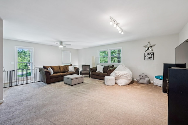 9505 Inavale Ln, Brentwood, TN 37027 - living room featuring carpet, plenty of natural light, and a ceiling fan