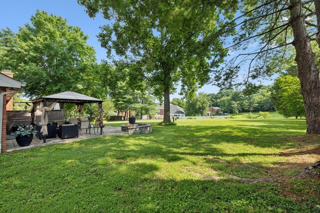 9505 Inavale Ln, Brentwood, TN 37027 - view of grassy yard with a gazebo, a patio area, and an outdoor living space