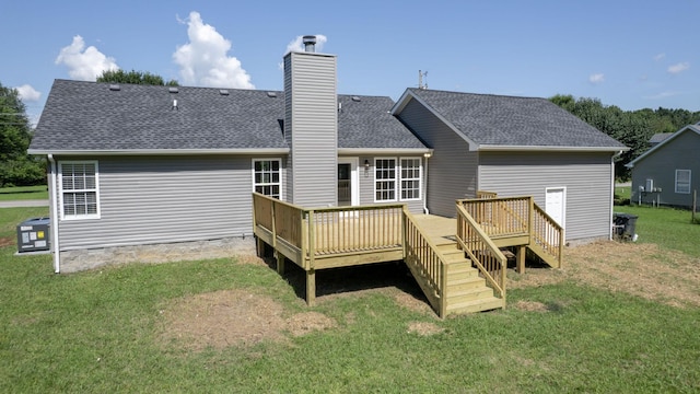 7313 Horn Tavern Ct, Fairview, TN 37062 - rear view of house featuring a lawn, a deck, a shingled roof, and a chimney