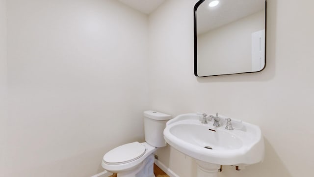 2104 W Richmond Hill Dr, Nashville, TN 37207 - half bathroom featuring toilet and a sink