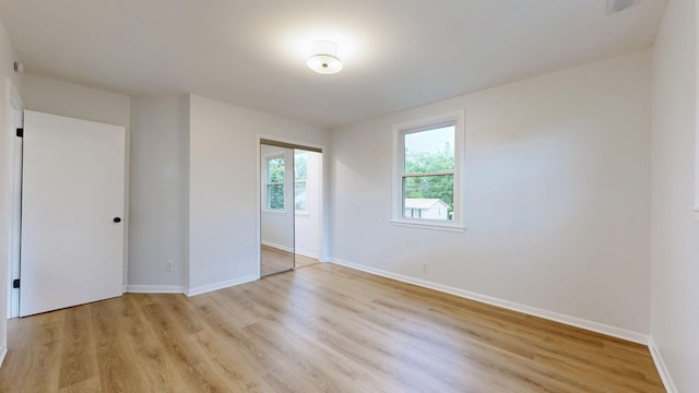2104 W Richmond Hill Dr, Nashville, TN 37207 - unfurnished bedroom featuring light wood-style floors and a closet