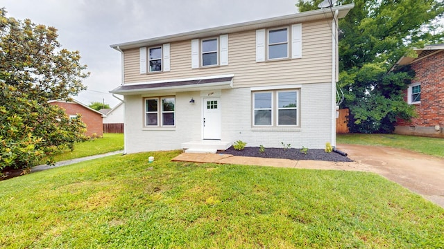 2104 W Richmond Hill Dr, Nashville, TN 37207 - traditional-style house featuring brick siding and a front lawn
