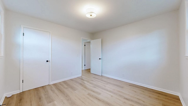 2104 W Richmond Hill Dr, Nashville, TN 37207 - unfurnished bedroom with light wood-style floors and baseboards
