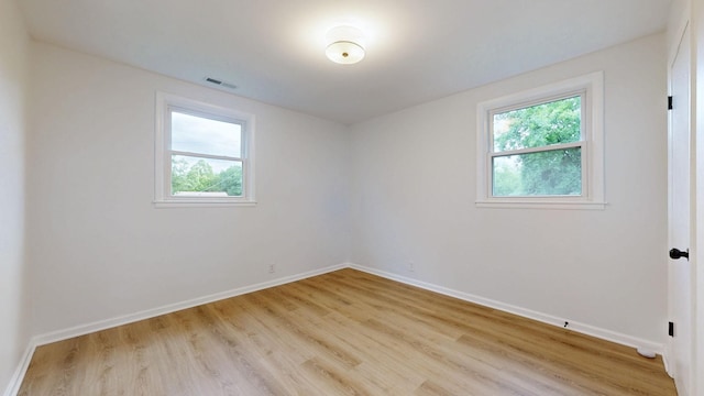 2104 W Richmond Hill Dr, Nashville, TN 37207 - empty room featuring plenty of natural light and light wood-style floors