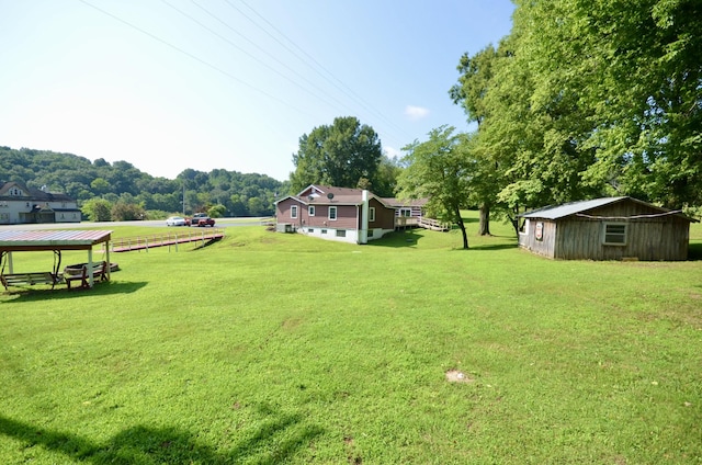 1355 Westfield Rd, Dickson, TN 37055 - view of grassy yard with an outdoor structure
