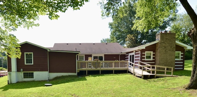1355 Westfield Rd, Dickson, TN 37055 - back of house featuring a wooden deck, a lawn, and a chimney
