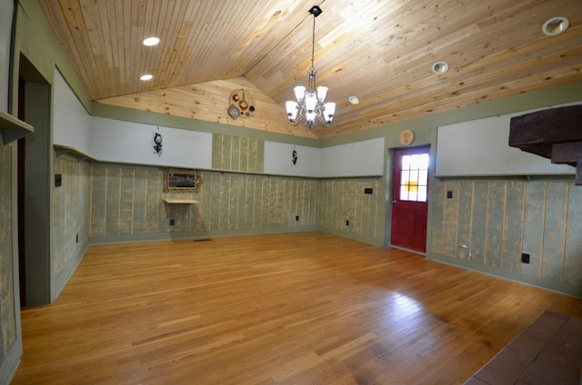 1355 Westfield Rd, Dickson, TN 37055 - empty room featuring wooden ceiling, lofted ceiling, a chandelier, wood finished floors, and a wainscoted wall