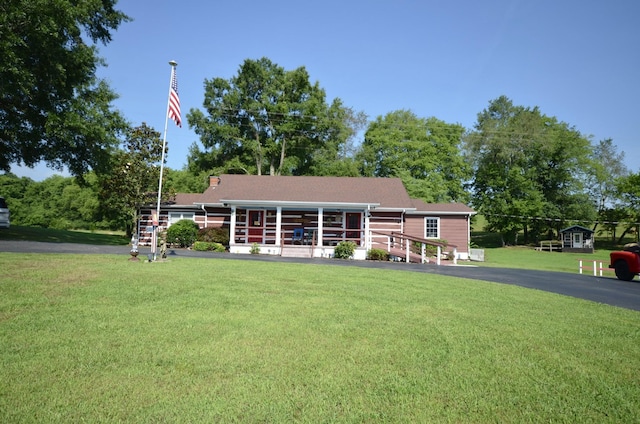 1355 Westfield Rd, Dickson, TN 37055 - view of front facade with a front yard