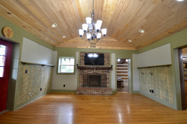 1355 Westfield Rd, Dickson, TN 37055 - unfurnished living room featuring wood ceiling, lofted ceiling, wood finished floors, a brick fireplace, and a chandelier