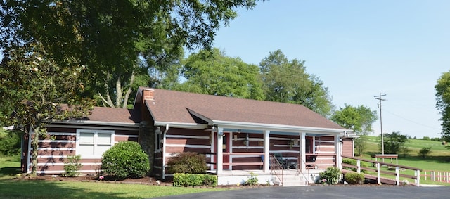 1355 Westfield Rd, Dickson, TN 37055 - view of front of home with a front yard, a porch, and a chimney