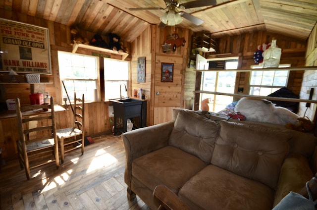 1355 Westfield Rd, Dickson, TN 37055 - living room with vaulted ceiling, wood walls, wood ceiling, hardwood / wood-style floors, and a ceiling fan