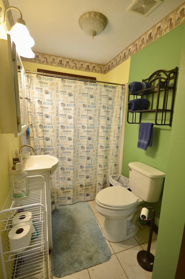 1355 Westfield Rd, Dickson, TN 37055 - full bathroom with tile patterned floors, curtained shower, and vanity