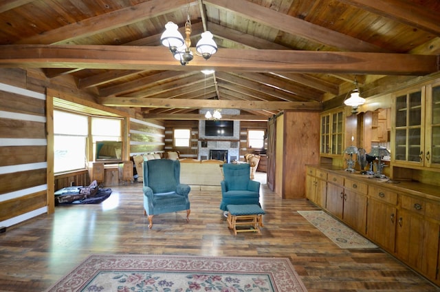 1355 Westfield Rd, Dickson, TN 37055 - living area featuring a chandelier, dark wood-style flooring, wood walls, a large fireplace, and wooden ceiling