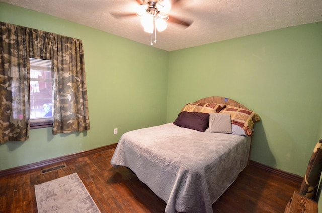 1355 Westfield Rd, Dickson, TN 37055 - bedroom with wood finished floors, a textured ceiling, and ceiling fan